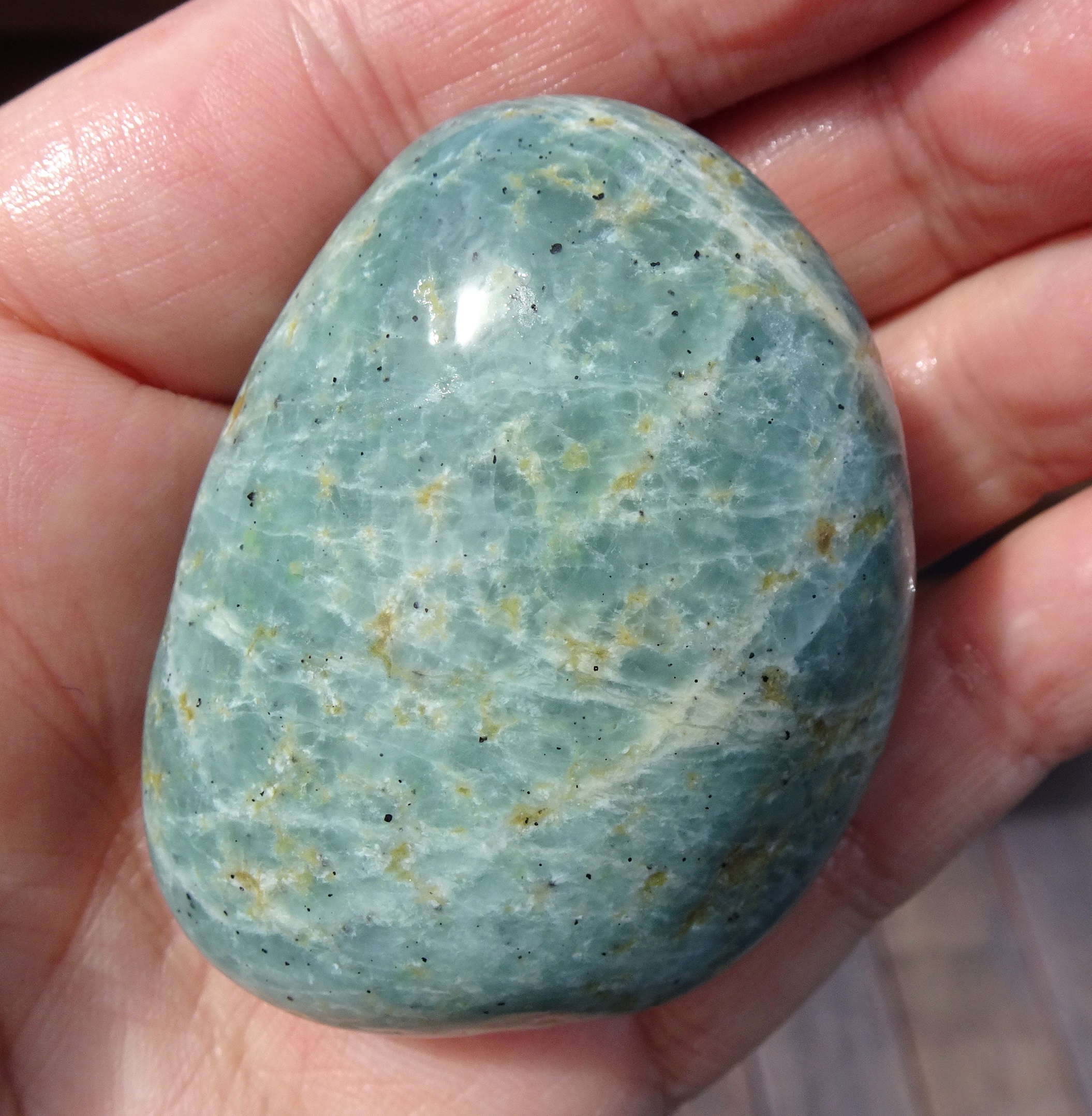 I suspect this is also a hydrogrossular garnet, but not sure.
