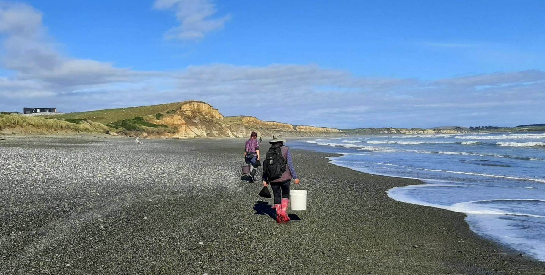 Not far from arriving back at the Gemstone Beach carpark, moving slower than usual. Nicola bringing up the rear, carrying Angie's big stone as well as a few of her own!