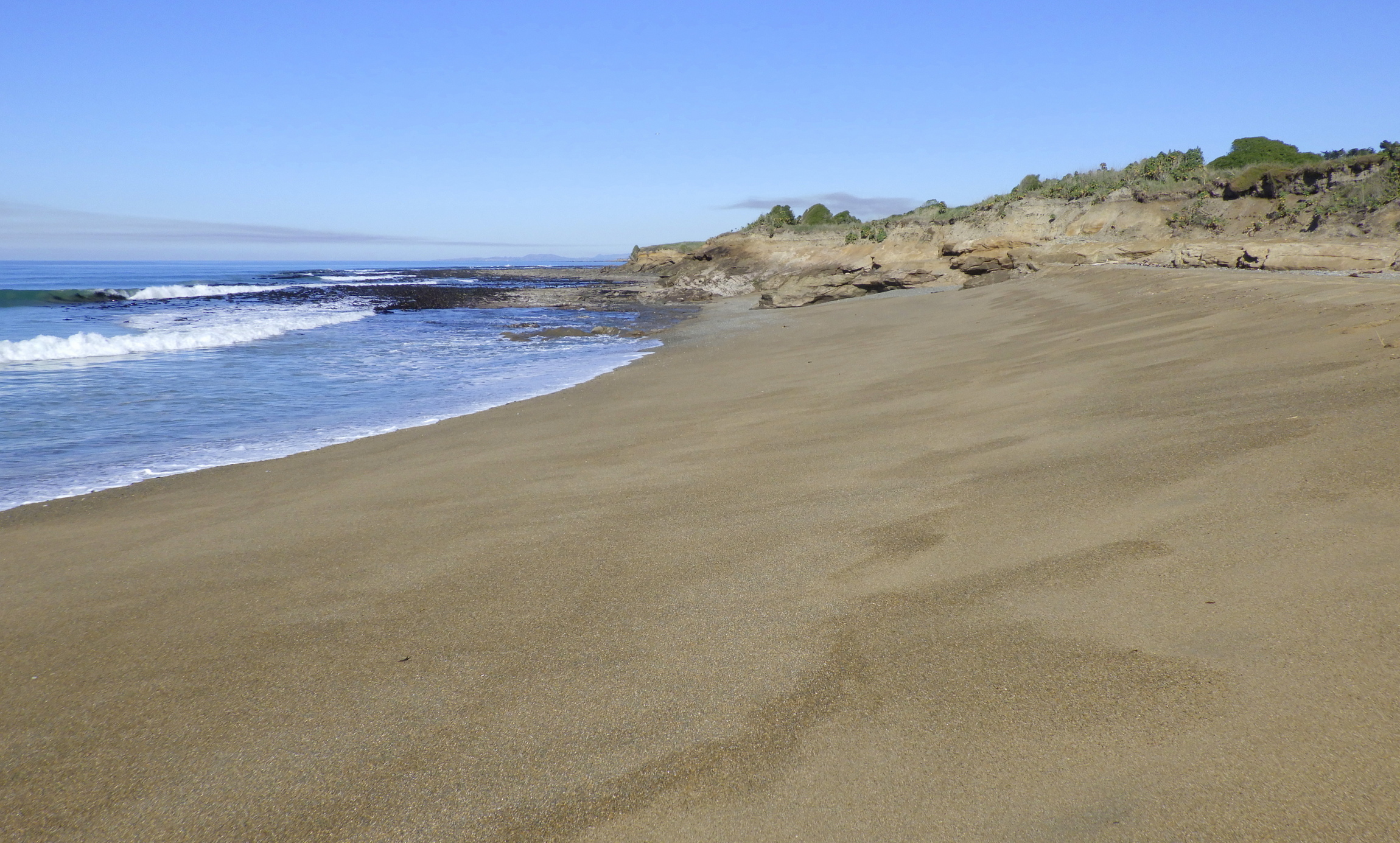 Lots of sand on the beach.