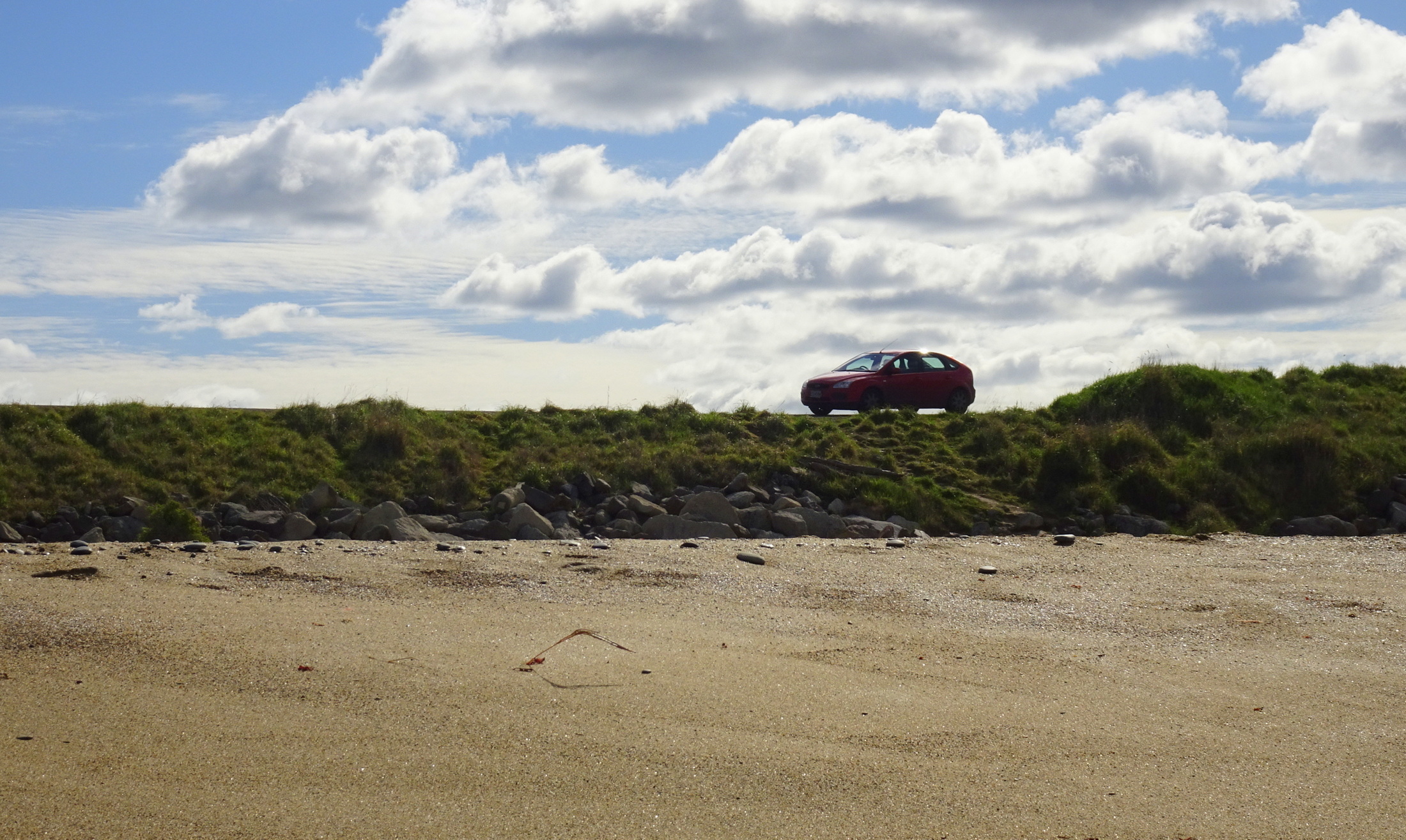 My car in the roadside parking area.