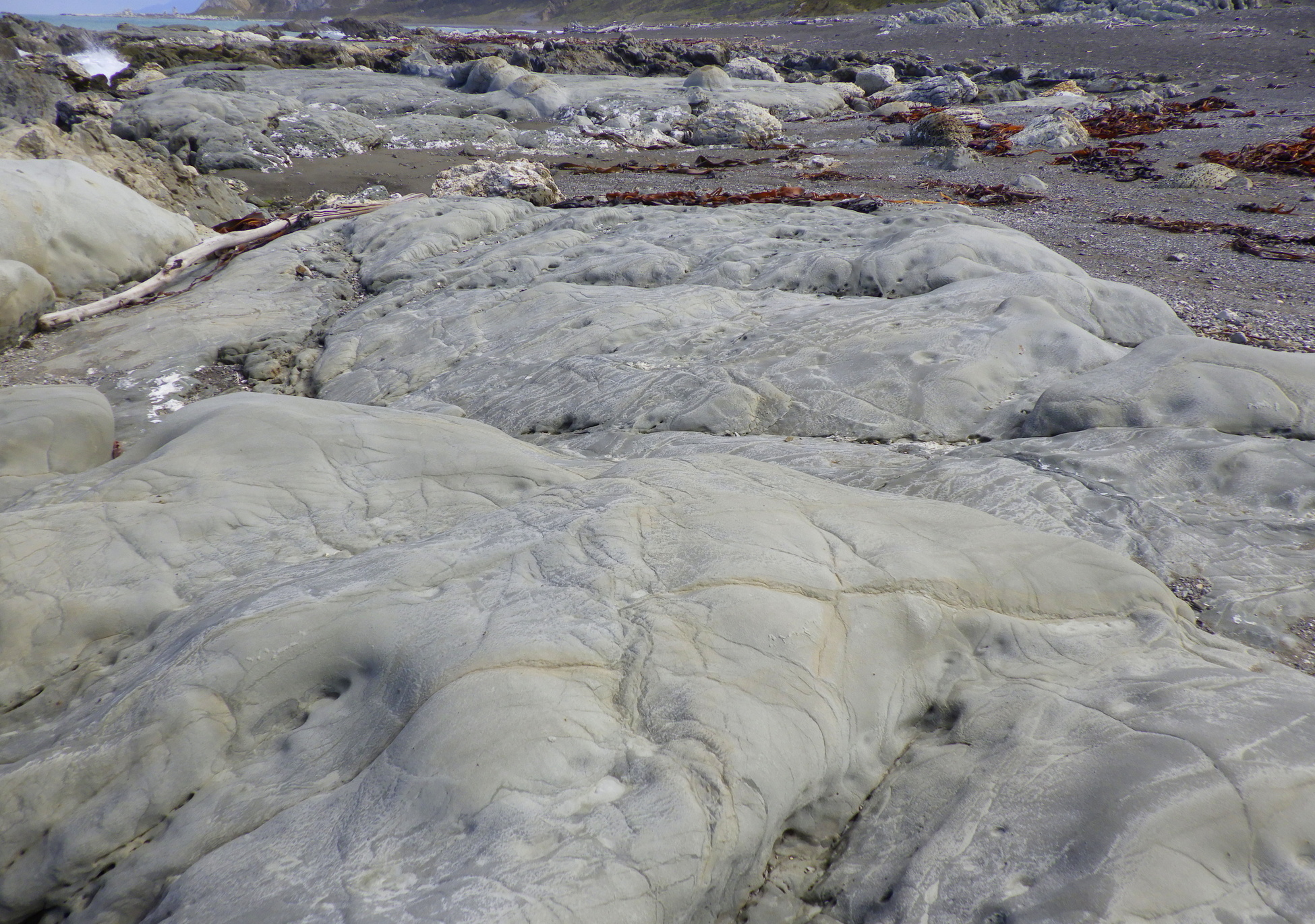 A smooth rounded rock area.