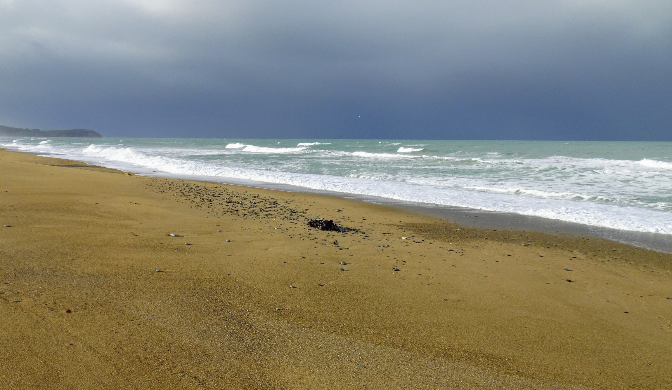 The dark clouds eventually delivered some freezing drops of rain.