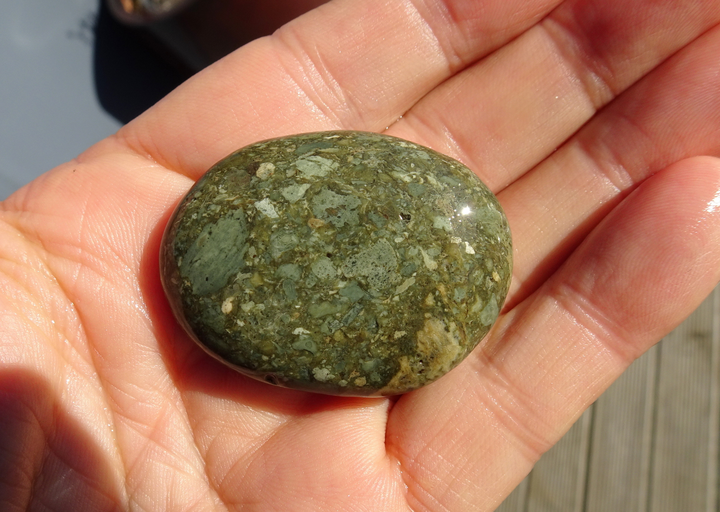 Green polymictic breccia.