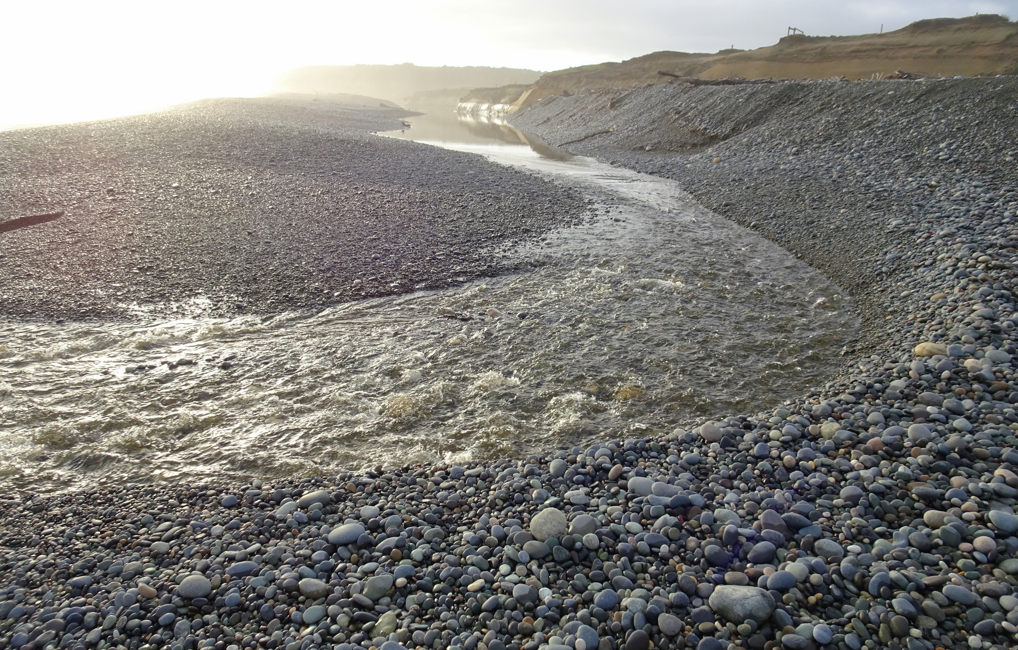 The Waimeamea River flowing from the lagoon to the sea.
