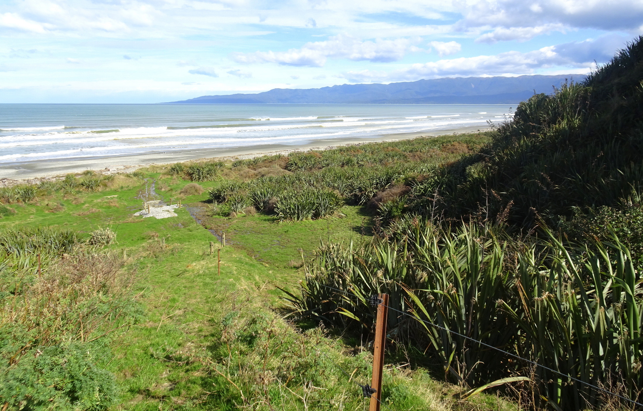 Walking down the steep track to Papatotara Beach.