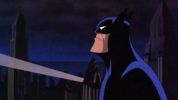 Batman looks upward, off screen