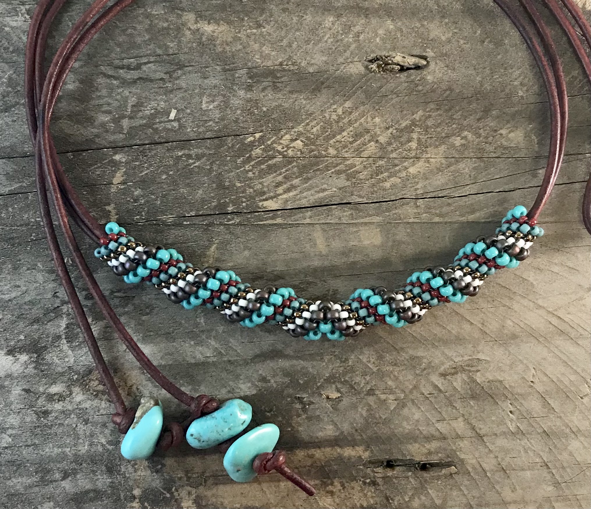 Cellini spiral mirrored necklace