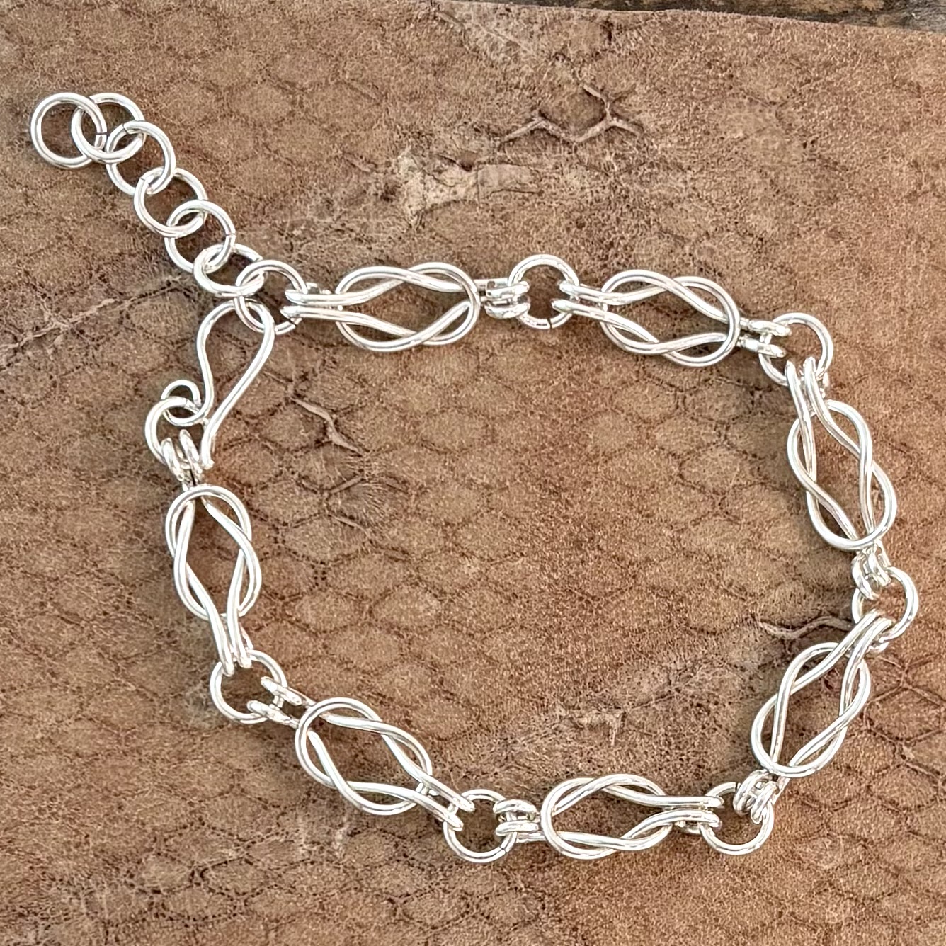 silver lover's knot bracelet