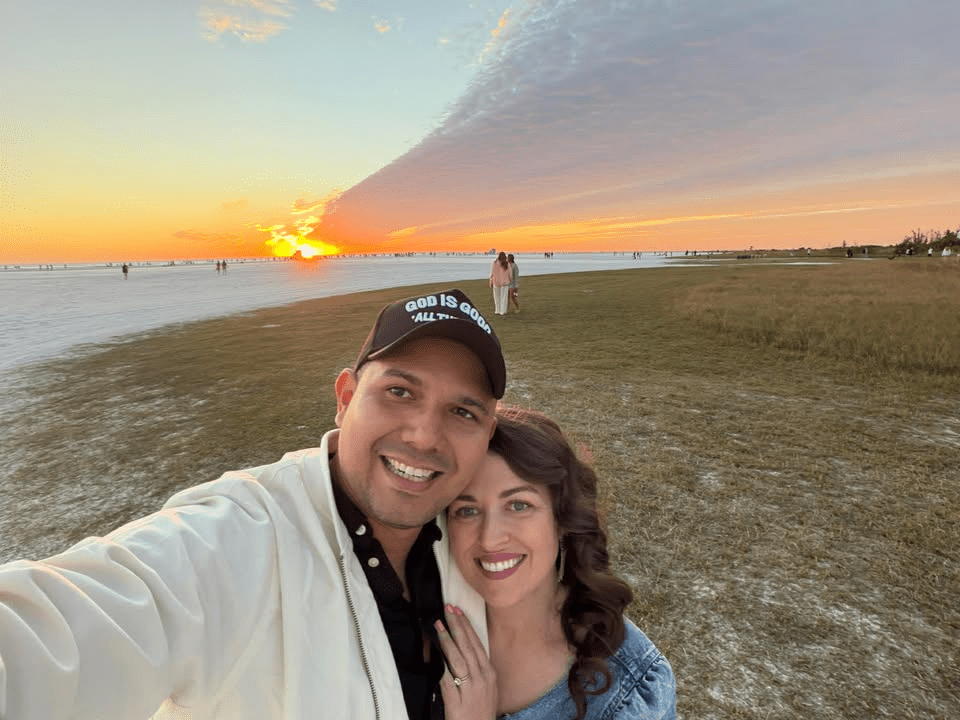 Mckinney's Rafael and Heather Alambarrio pictured together outdoors at sunset prior to his detention following an ICE check-in in North Texas