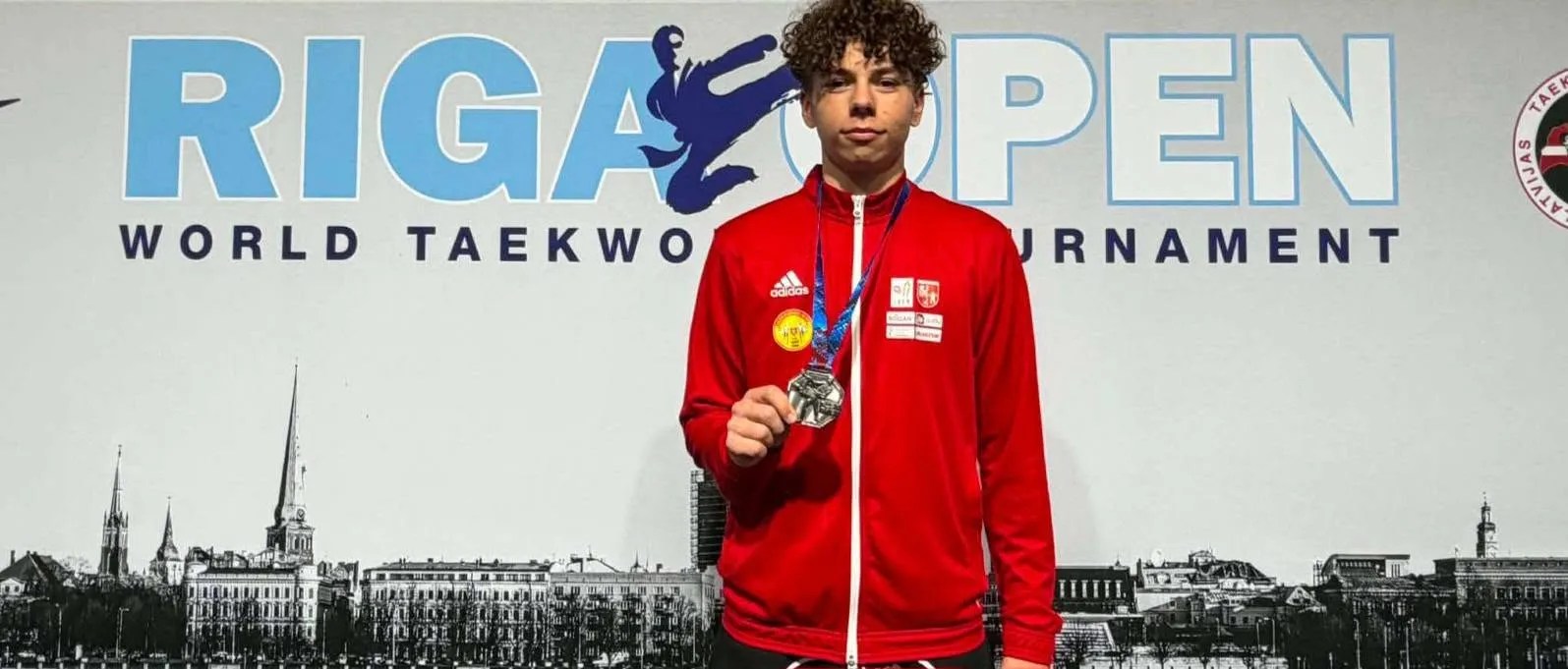 Jan Walkiewicz ze srebrnym medalem Pucharu Świata w taekwondo olimpijskim podczas Riga Open / fot.: Rapid Śrem