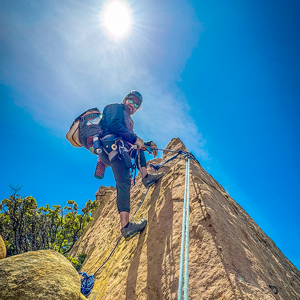 Climber on the Saddle Peak slab