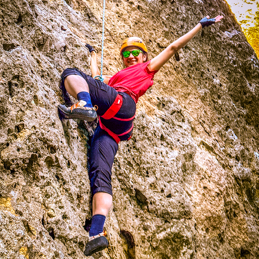 Smiling climber in a red shirt at Malibu Creek