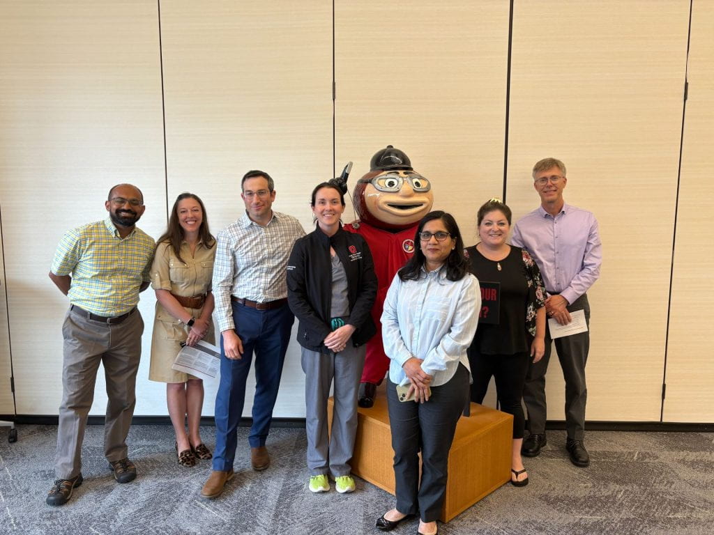 FLI Team 10 group in front of Brutus Buckeye statue