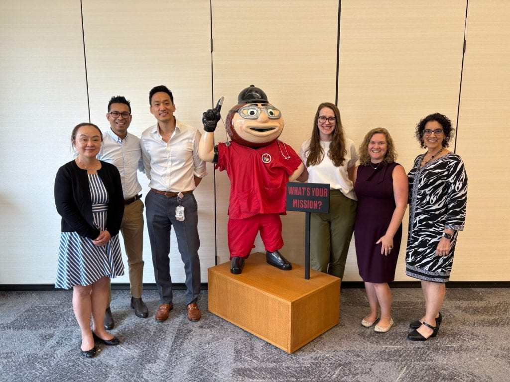 FLI Team 4 group in front of Brutus Buckeye statue