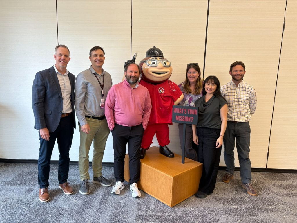 FLI Team 5 group in front of Brutus Buckeye statue