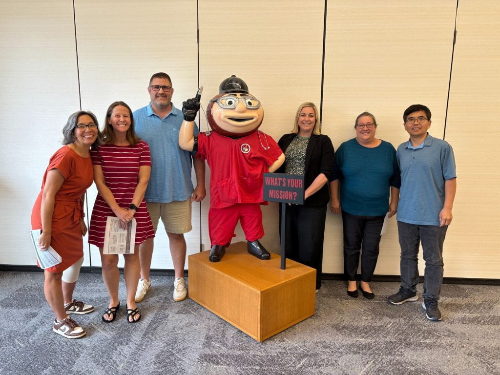 FLI Team 7 group in front of Brutus Buckeye statue