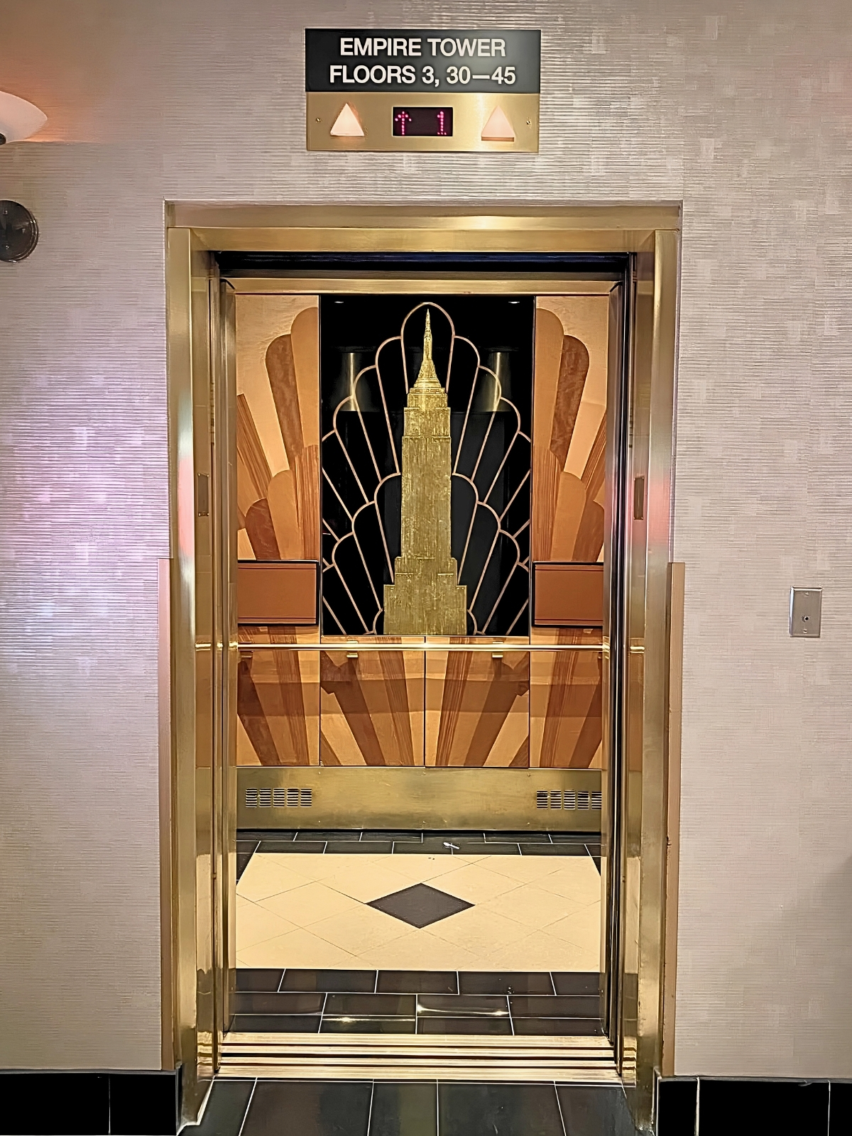 Deep-carved gold leaf elevator glass at New York-New York Las Vegas