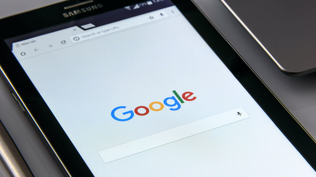Overhead shot of a tablet performing a Google search