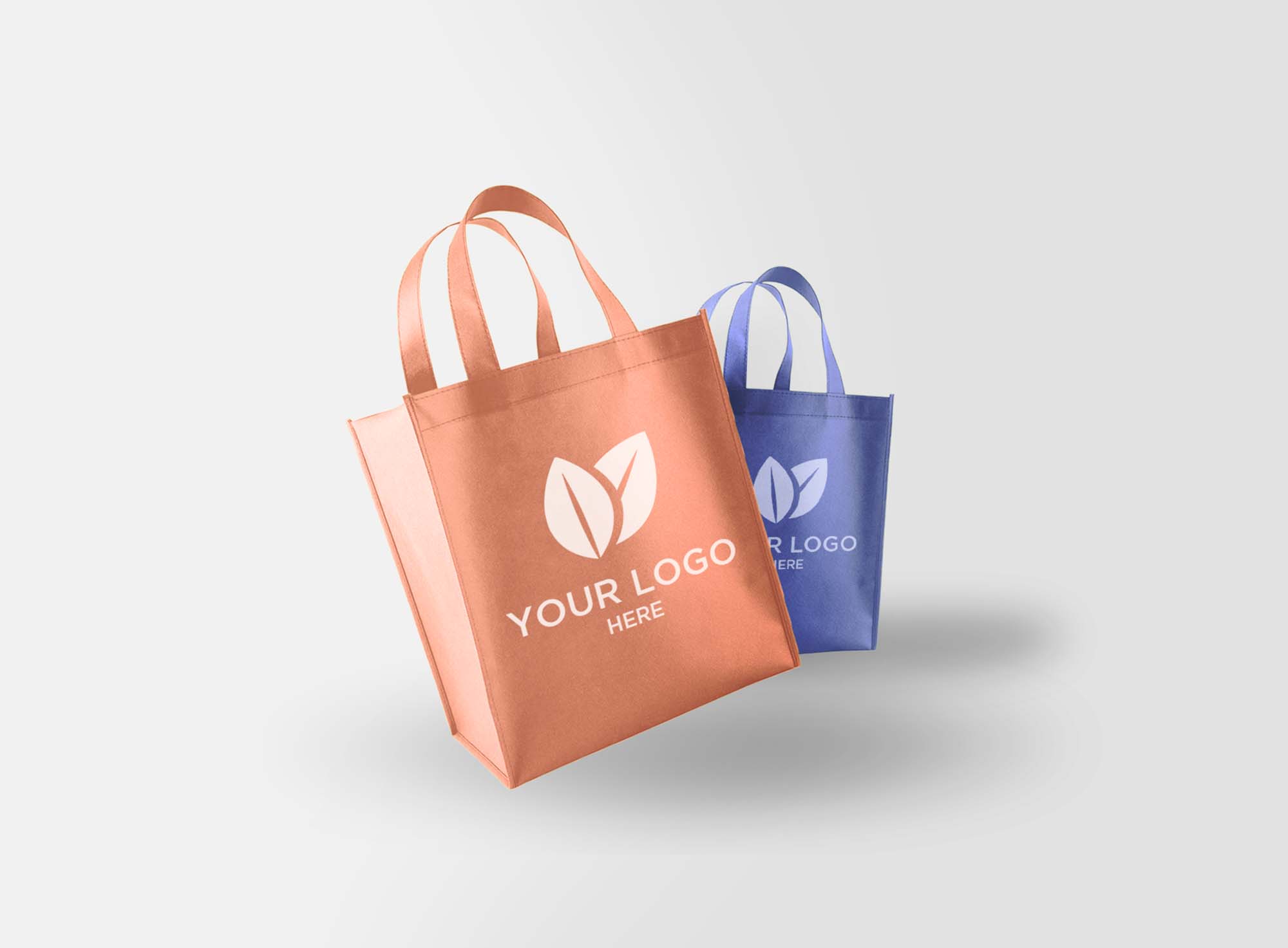 The above image demonstrates a picture of a light brown color paper bag with pink handle and a pink color card as well. Free Eco Friendly Bag Mockup Psd