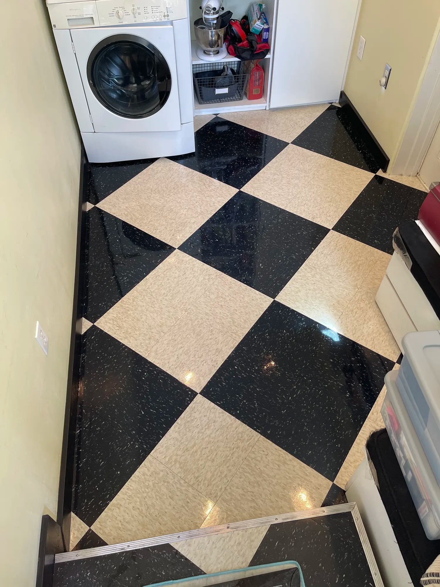 Finished high gloss polished black and white checkered commercial flooring