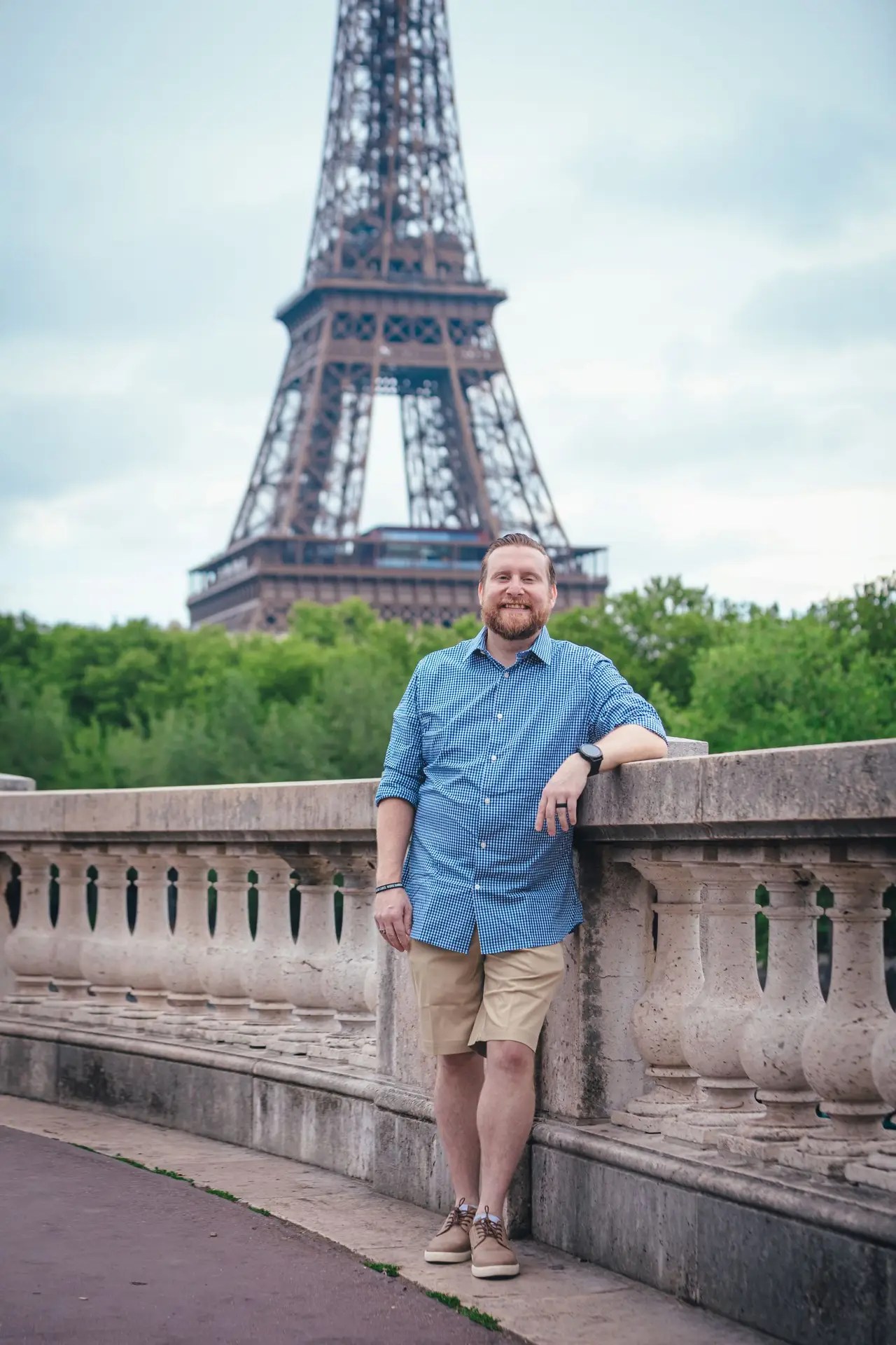 Gavin Swinney, founder of Unfinished Quest, at the Eiffel Tower in Paris
