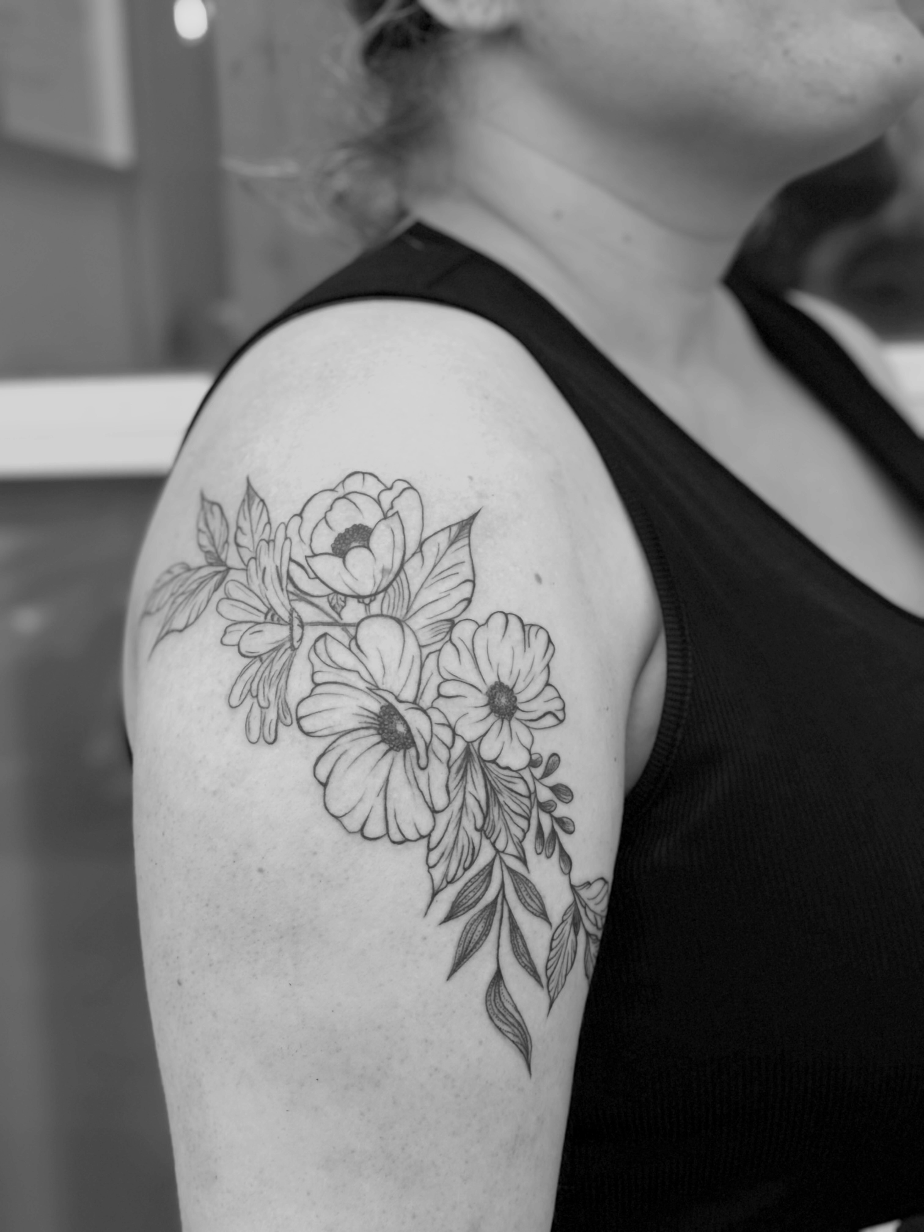 Floral tattoo on shoulder