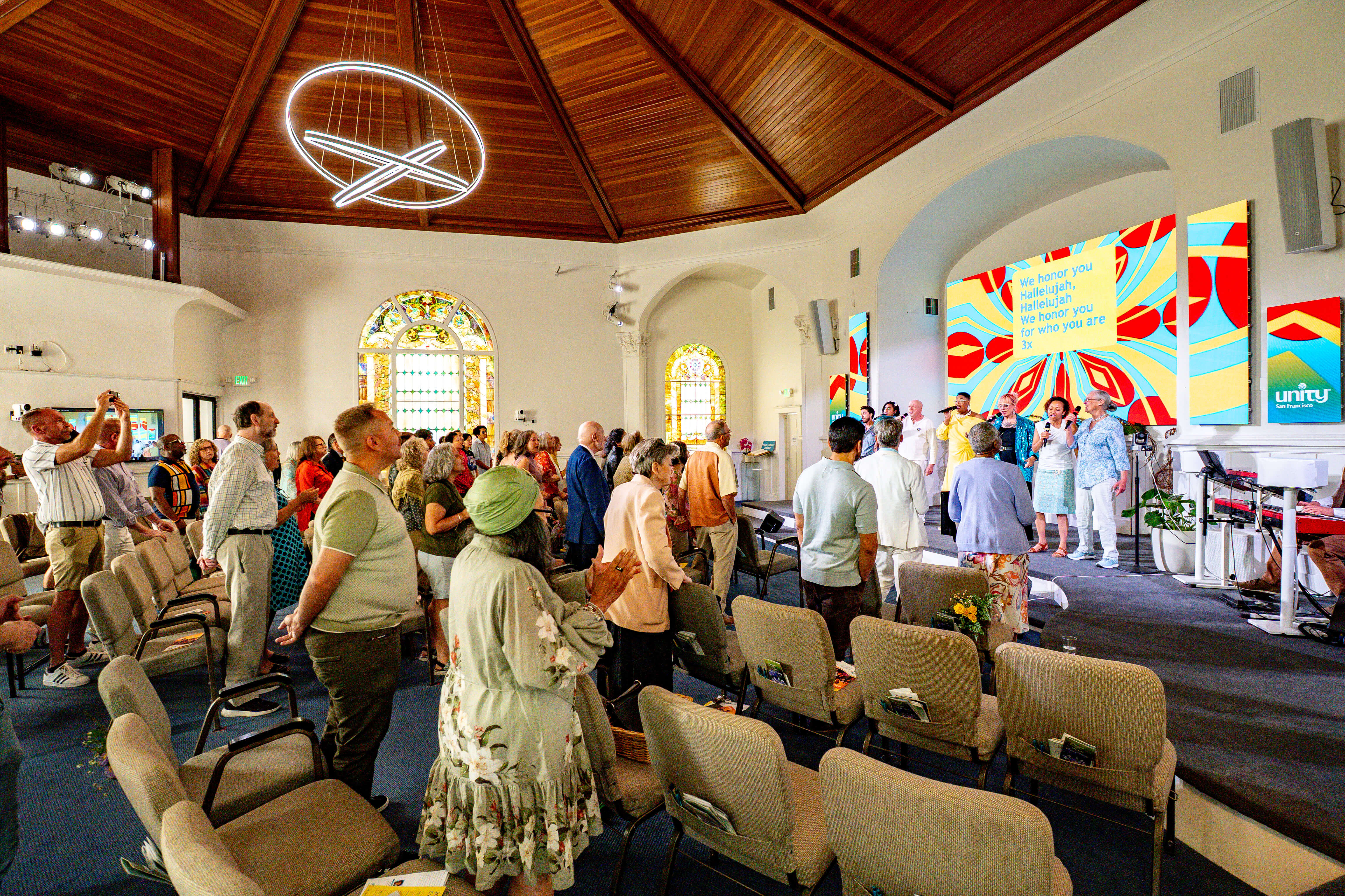 The Unity San Francisco sanctuary on a Sunday, the band performing and the room full