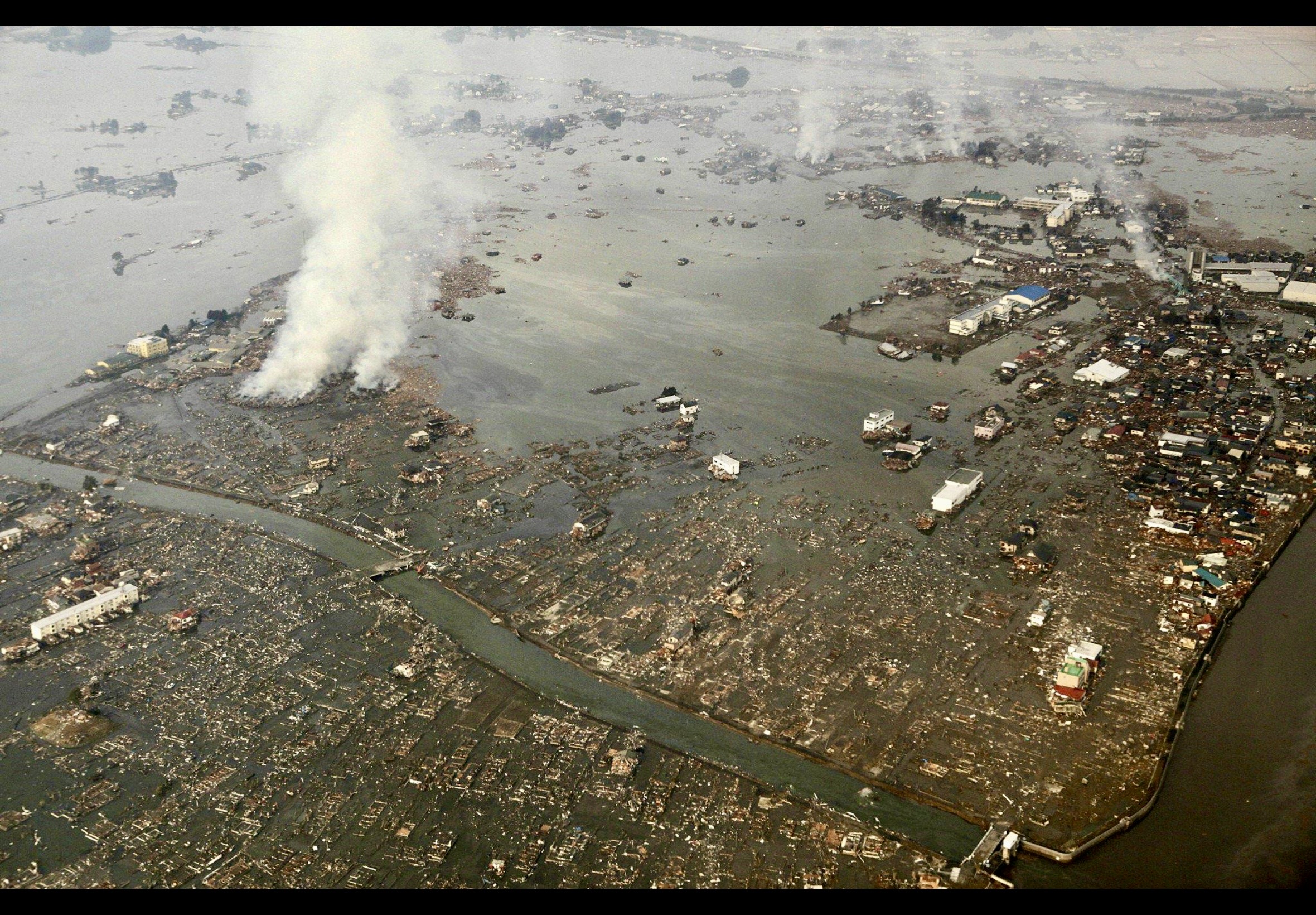Aerial view of destruction along Japan’s northeastern coast following the 2011 Tohoku earthquake and tsunami