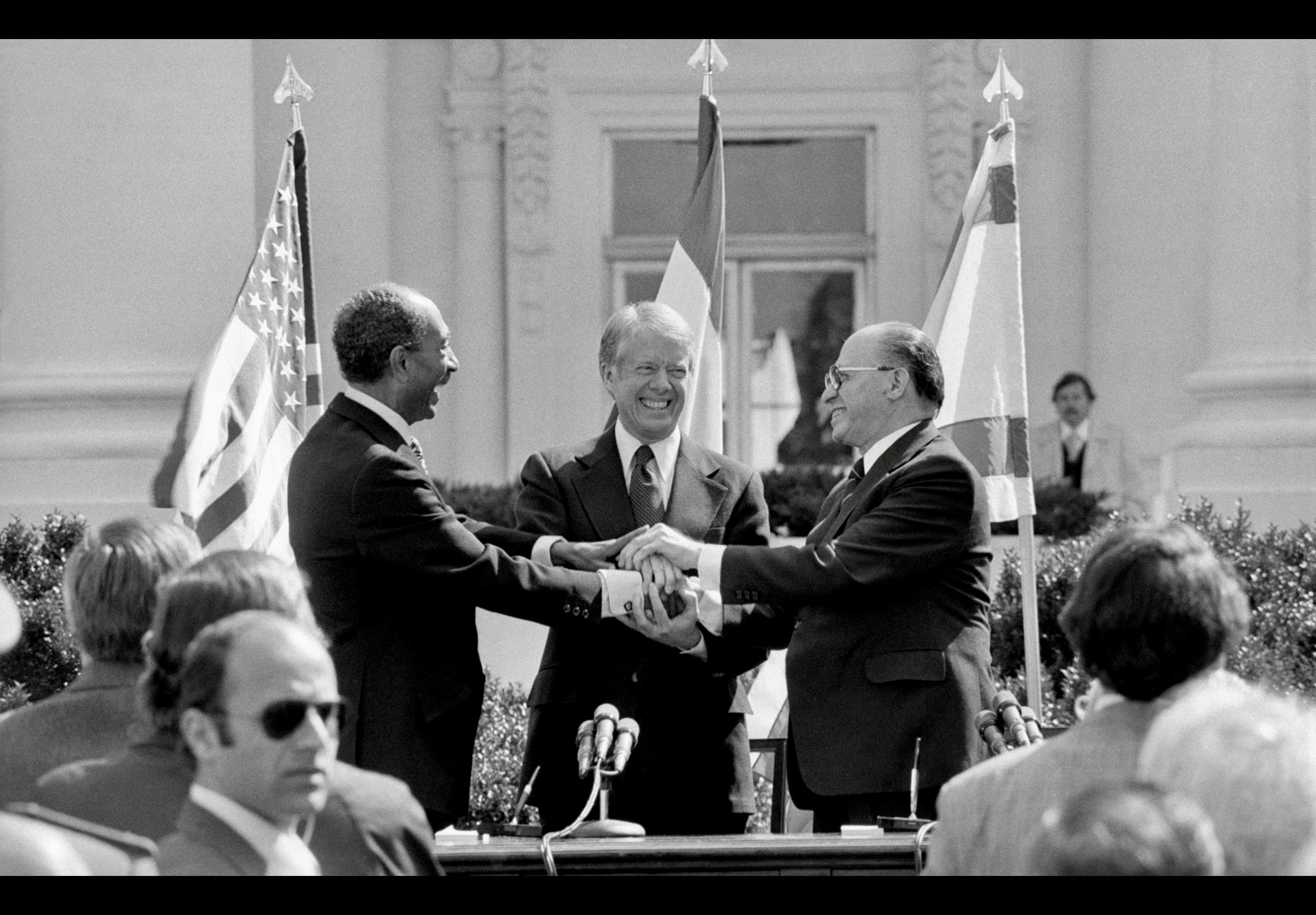 Signing ceremony of the 1979 Israel–Egypt Peace Treaty in Washington D.C. with leaders Jimmy Carter, Anwar Sadat, and Menachem Begin