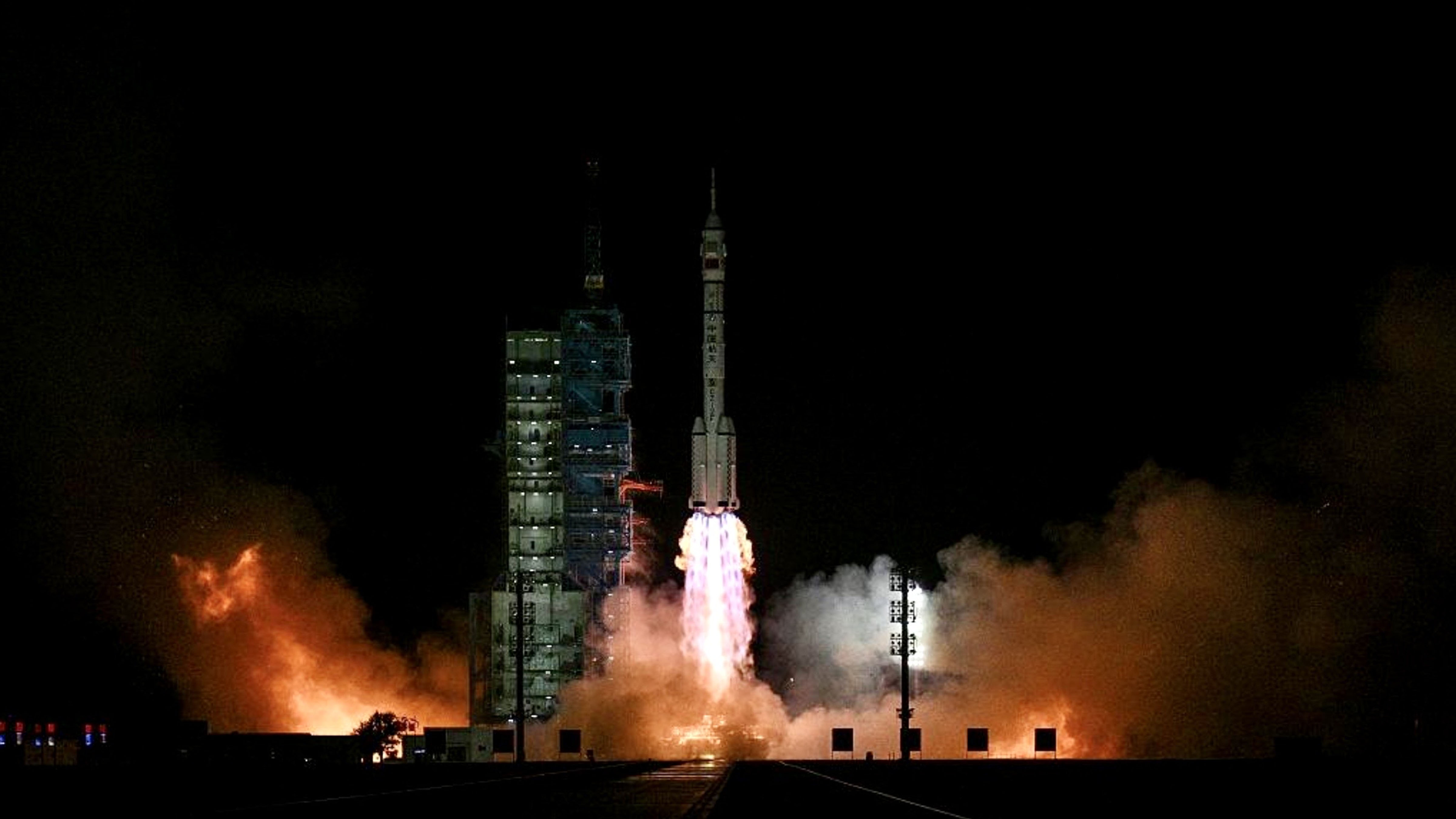 China’s Long March 2F rocket launches the Shenzhou-23 crewed spacecraft from the Jiuquan Satellite Launch Center during a nighttime mission.