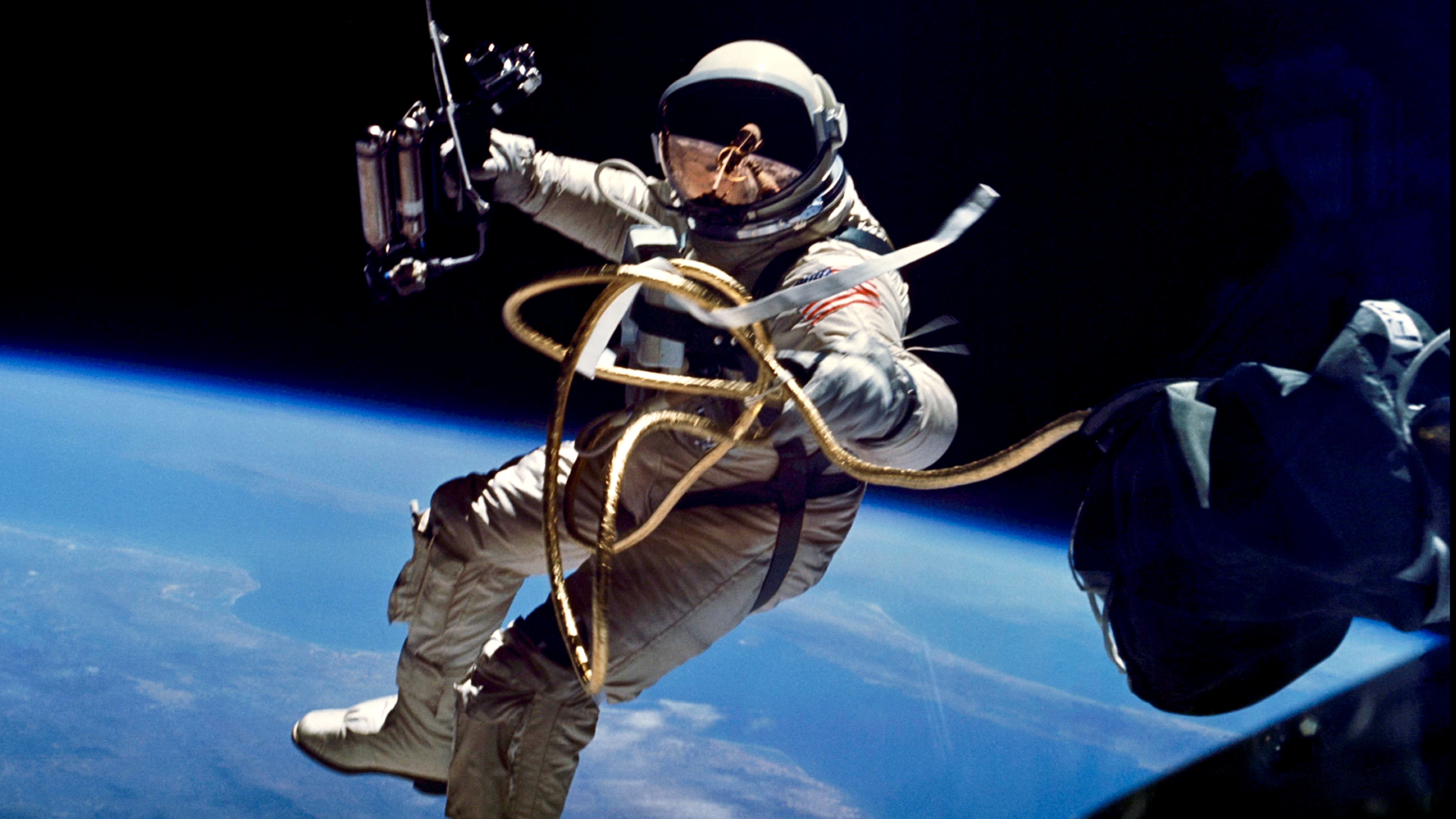 NASA astronaut Ed White floats outside the Gemini 4 spacecraft during the first American spacewalk on June 3, 1965.