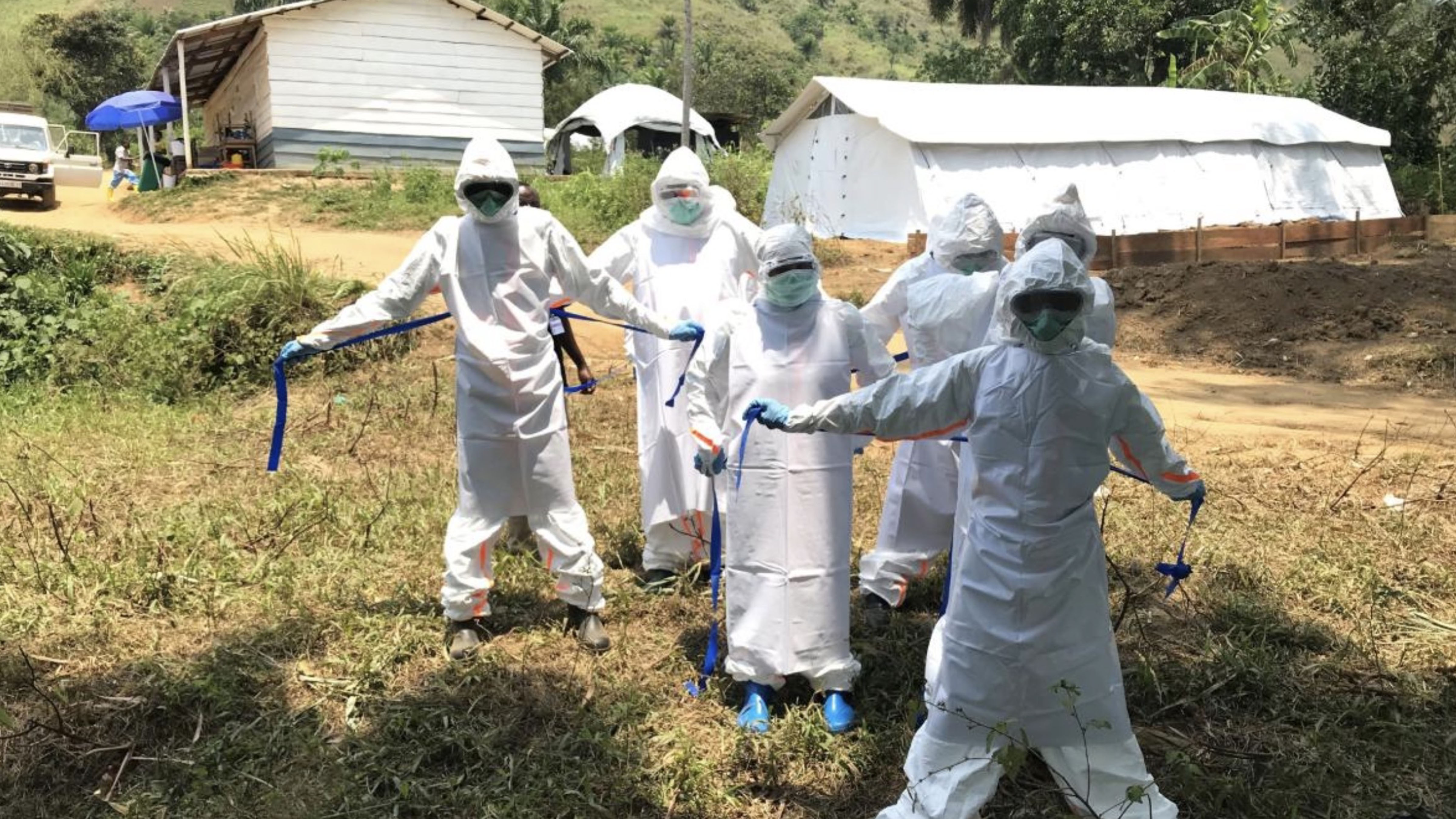Health workers wearing full protective equipment during Ebola outbreak response operations in the Democratic Republic of the Congo.