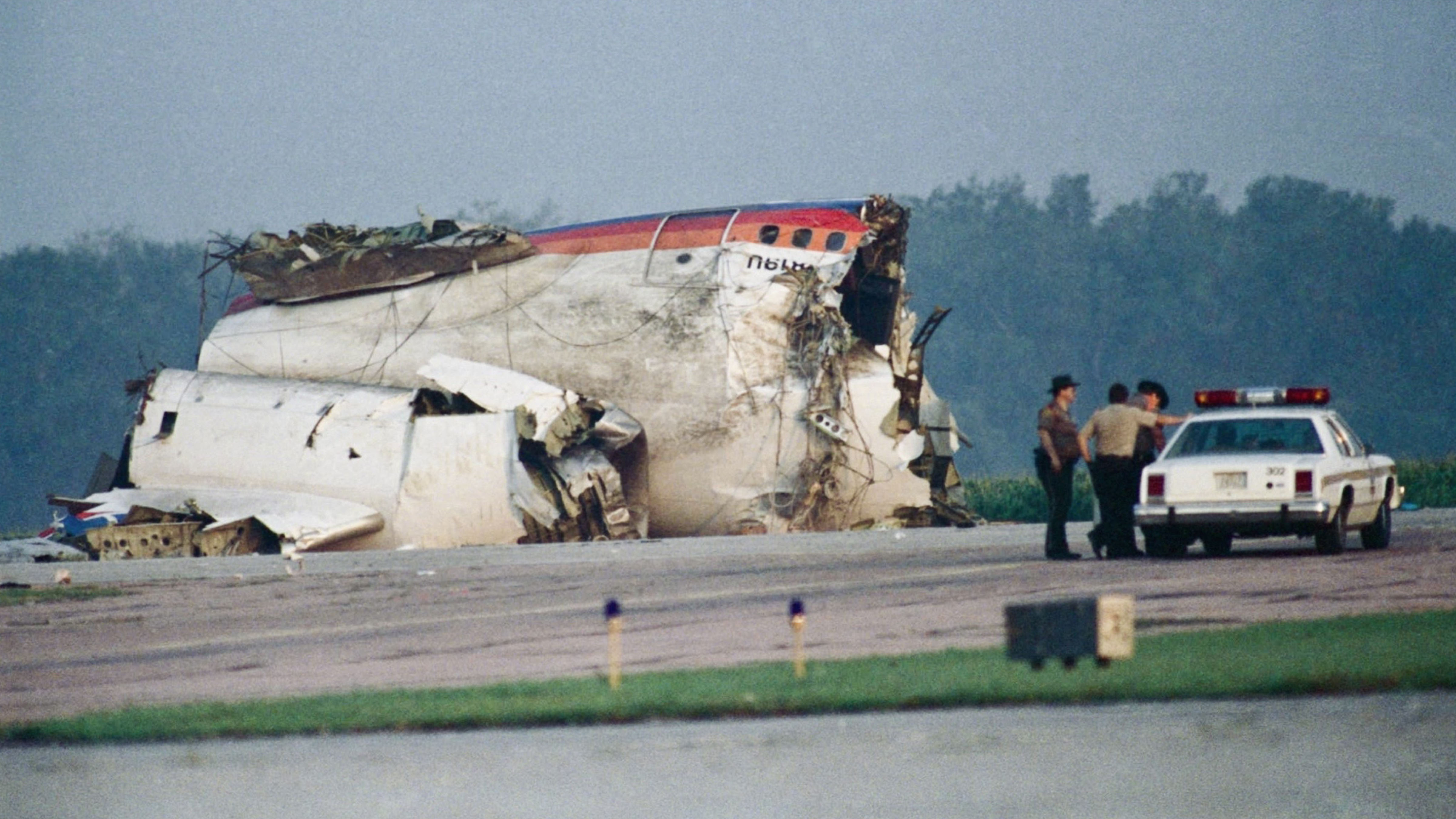The wreckage of United Airlines Flight 232 rests on the runway at Sioux Gateway Airport following the historic emergency landing on July 19, 1989.