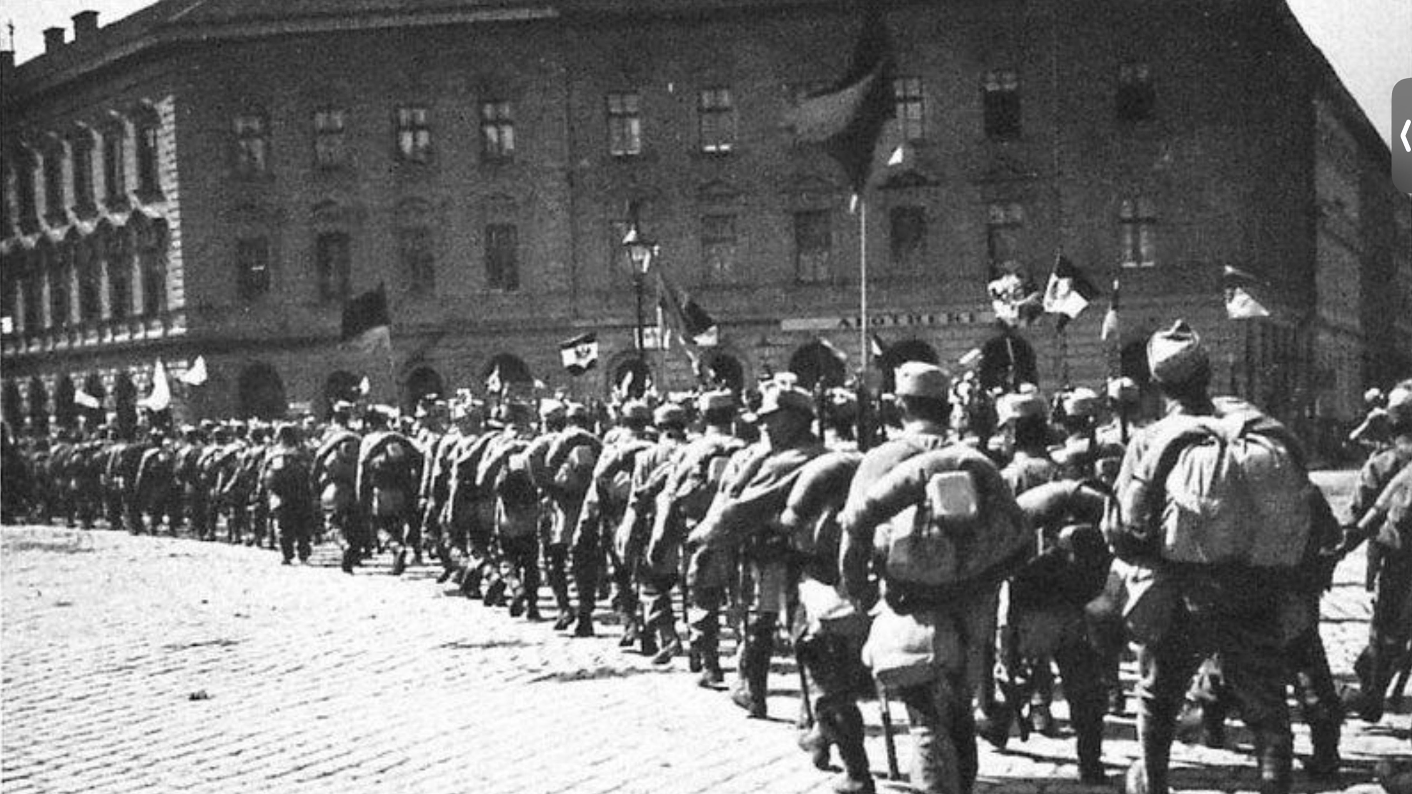 Public-domain photograph of Austro-Hungarian soldiers marching through a city after Austria-Hungary declared war on Serbia in July 1914.