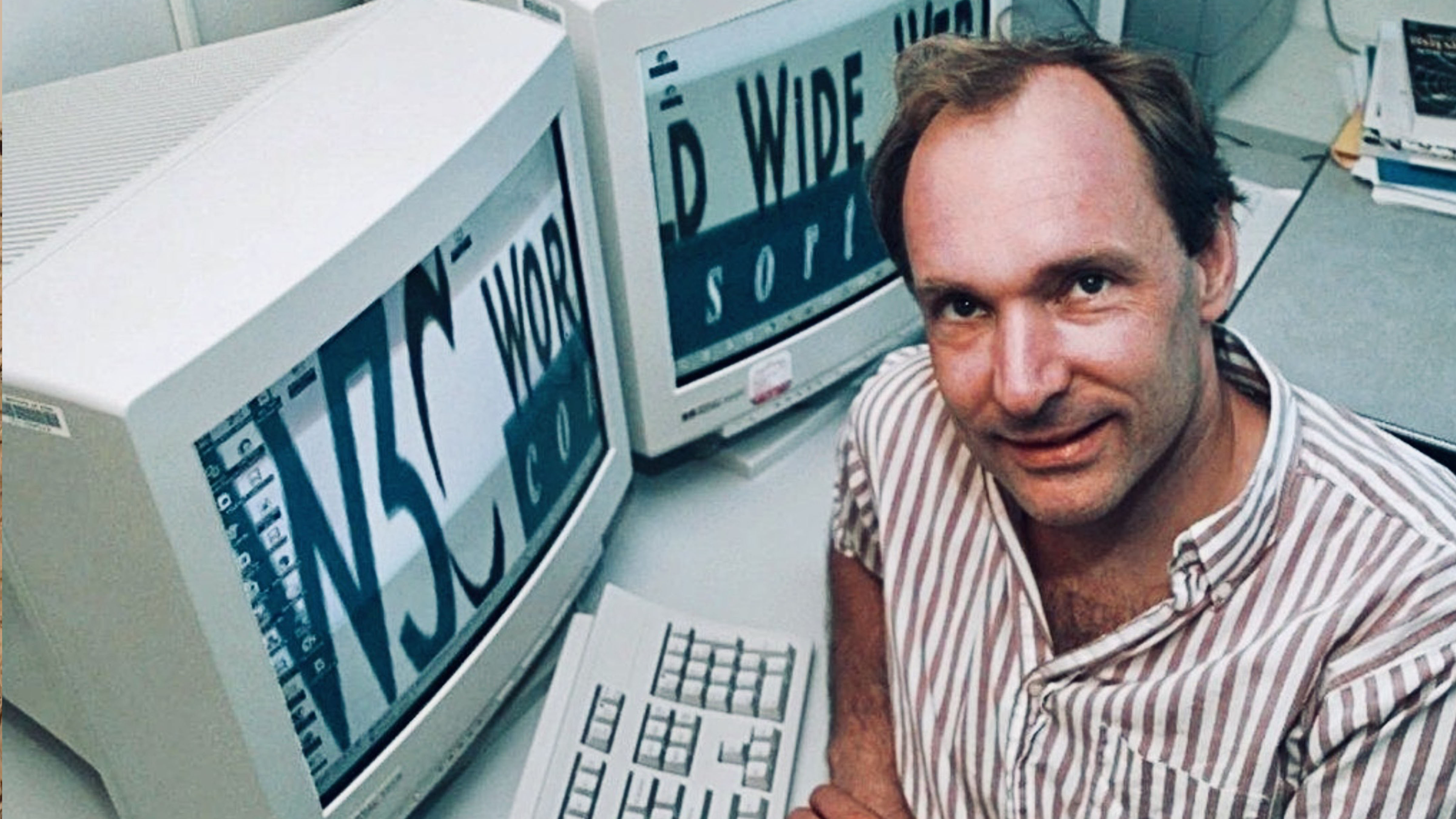 Tim Berners-Lee pictured with early computer workstations used during the development of the World Wide Web at CERN.