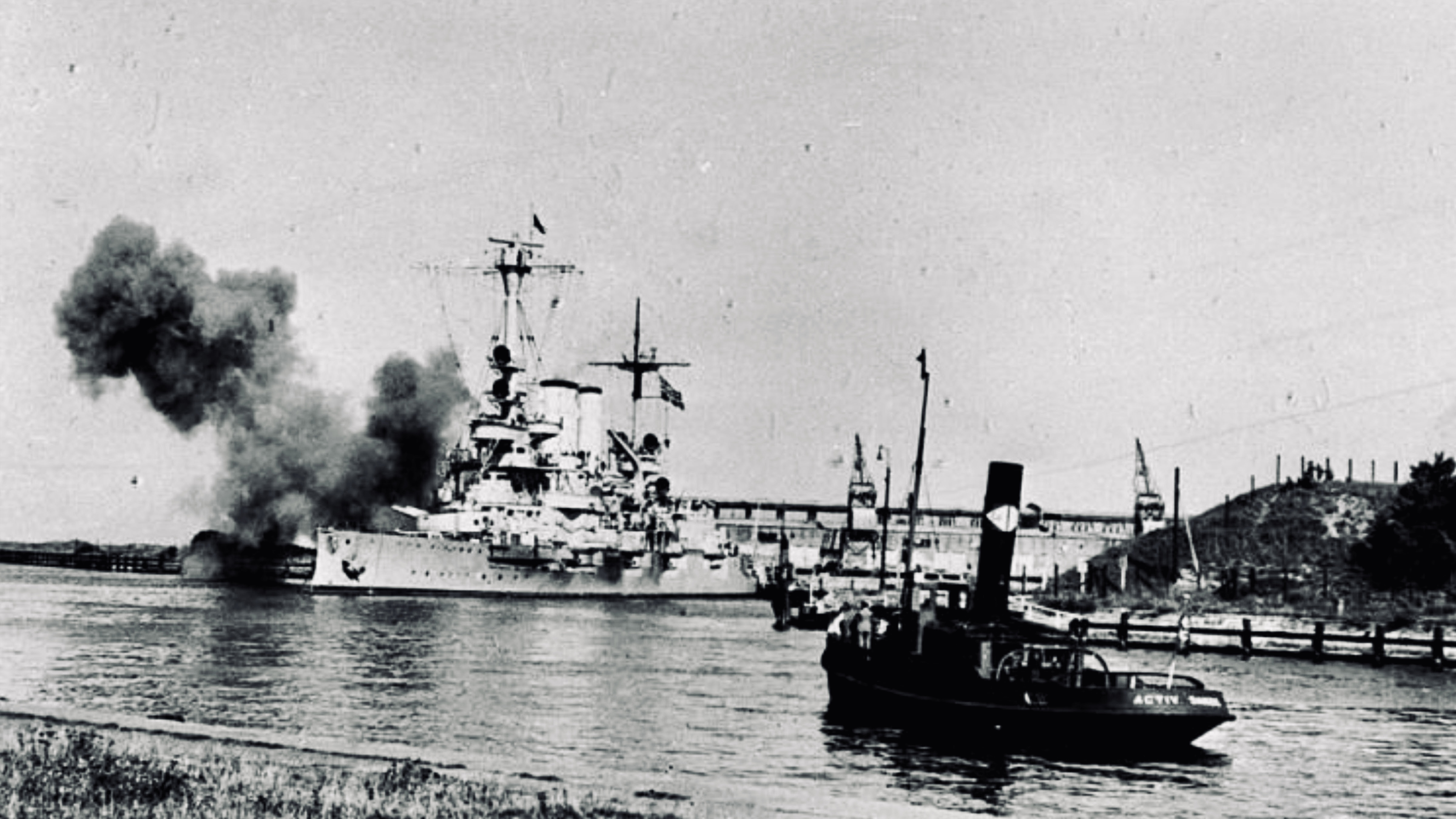 German battleship Schleswig-Holstein firing on Westerplatte during the invasion of Poland on September 1, 1939.