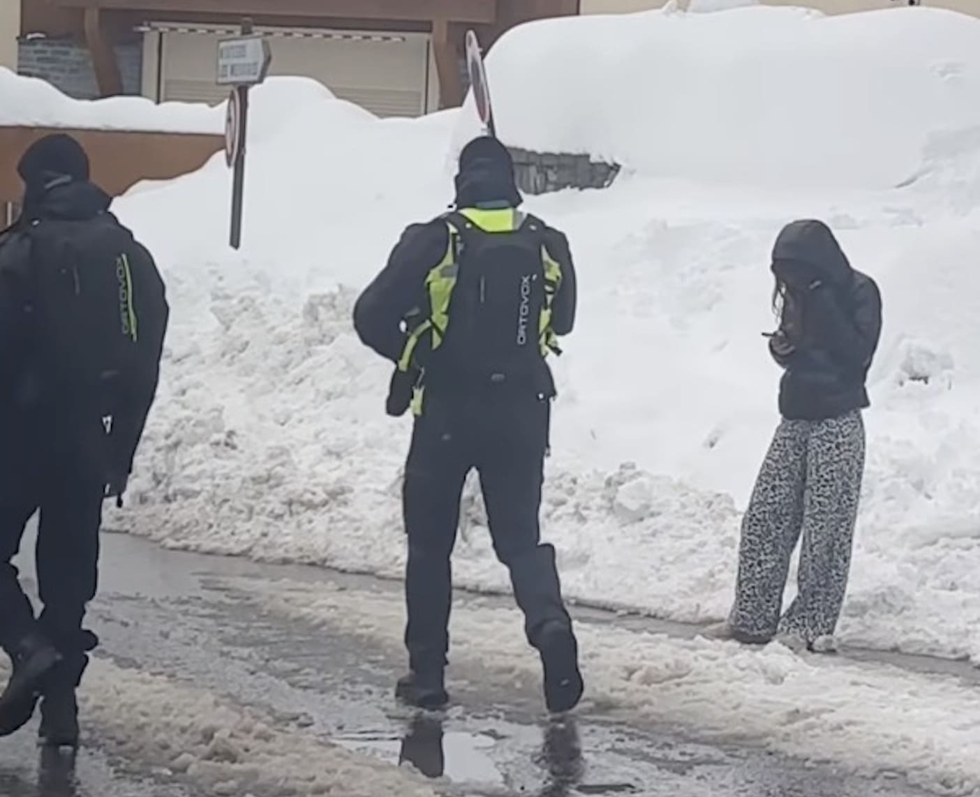Police in Val Thorens wearing avalanche bags.