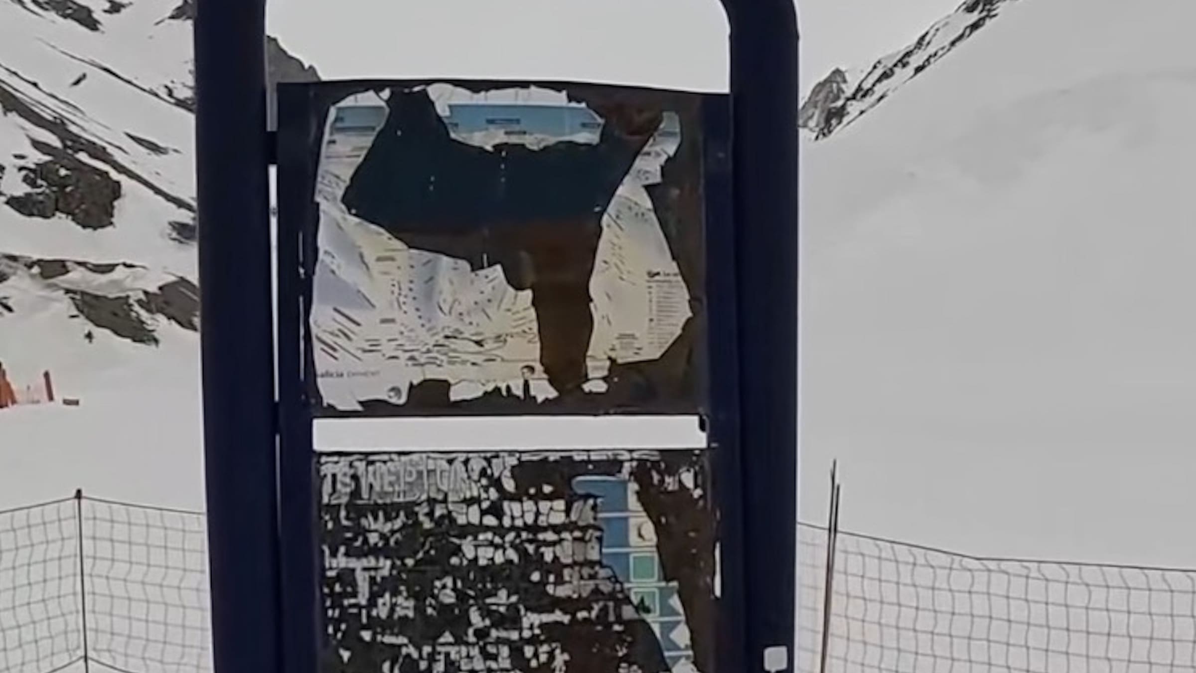 Dilapidated trail map at a South American ski resort.