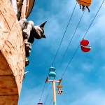 A golem watching over the sky glider at the boardwalk in Santa Cruz.