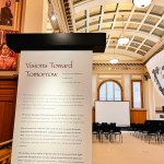 Poster announcing the ongoing exhibit at the AAMLO: Visions Toward Tomorrow