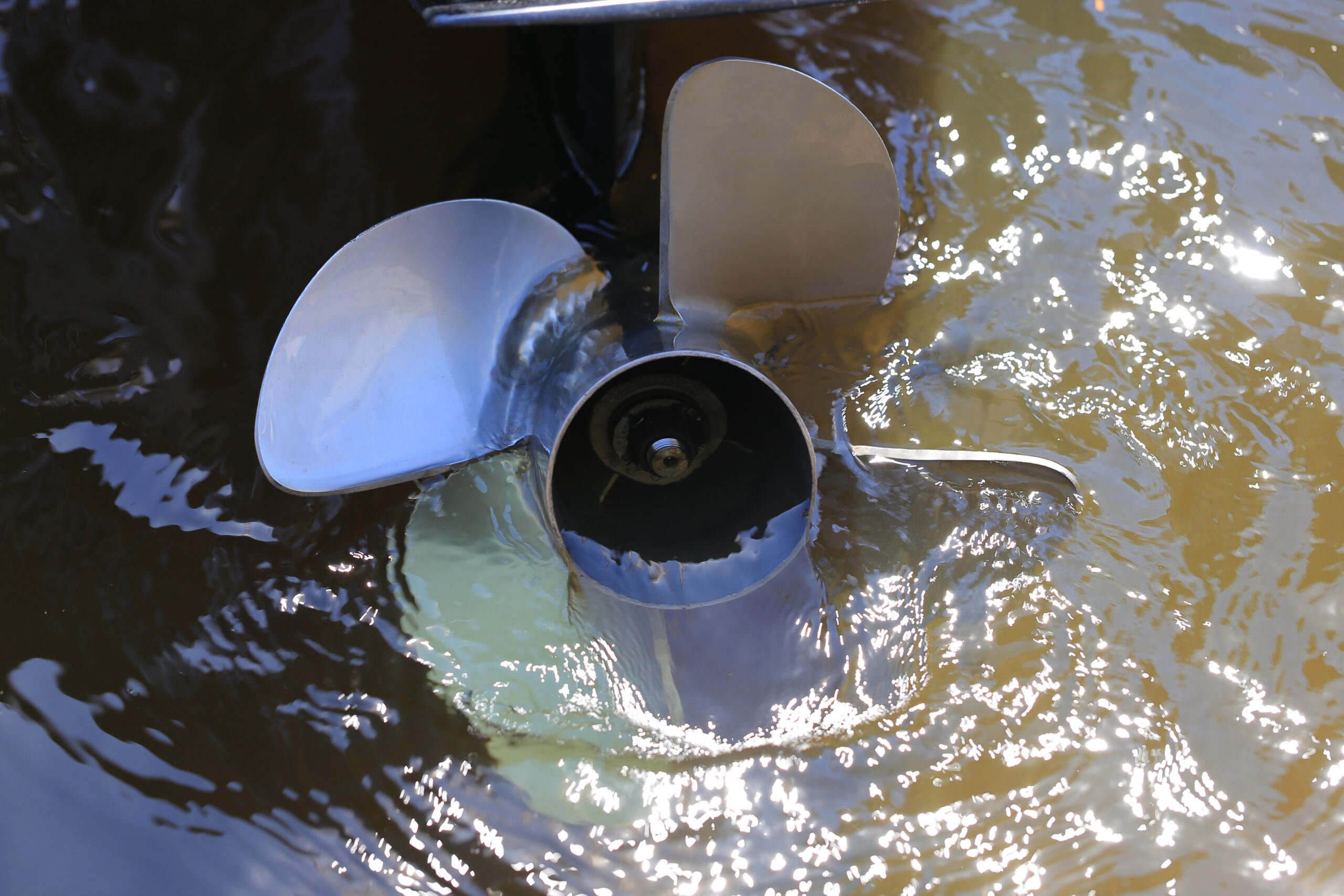 Motor boat screw close up. Engine propeller