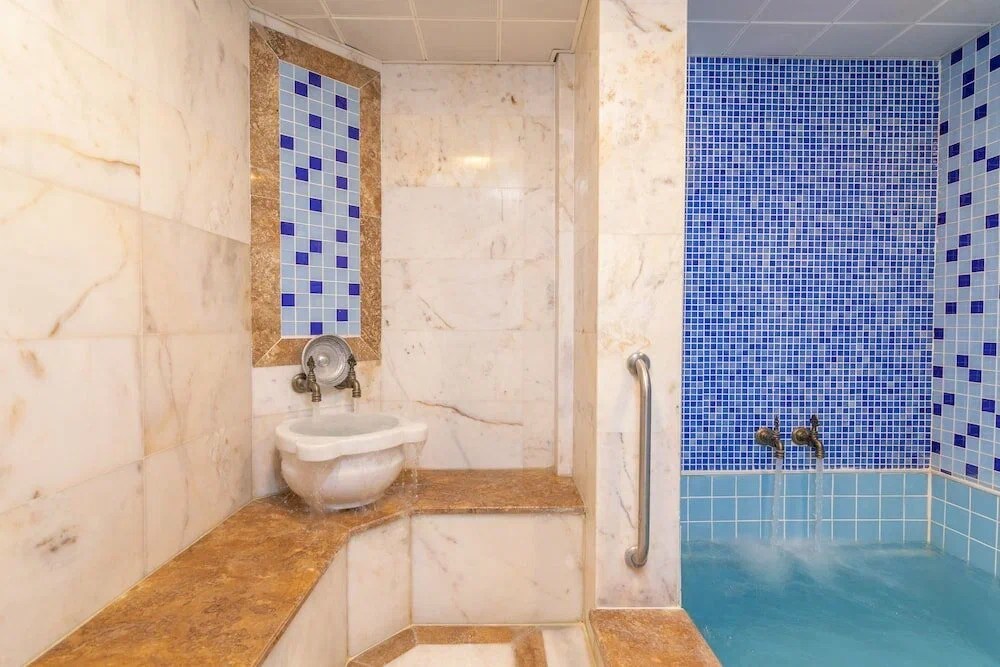 Each room hides a private thermal pool, roughly 2 × 3 meters in size and about five feet deep.Photo: Aforia Thermal Residences