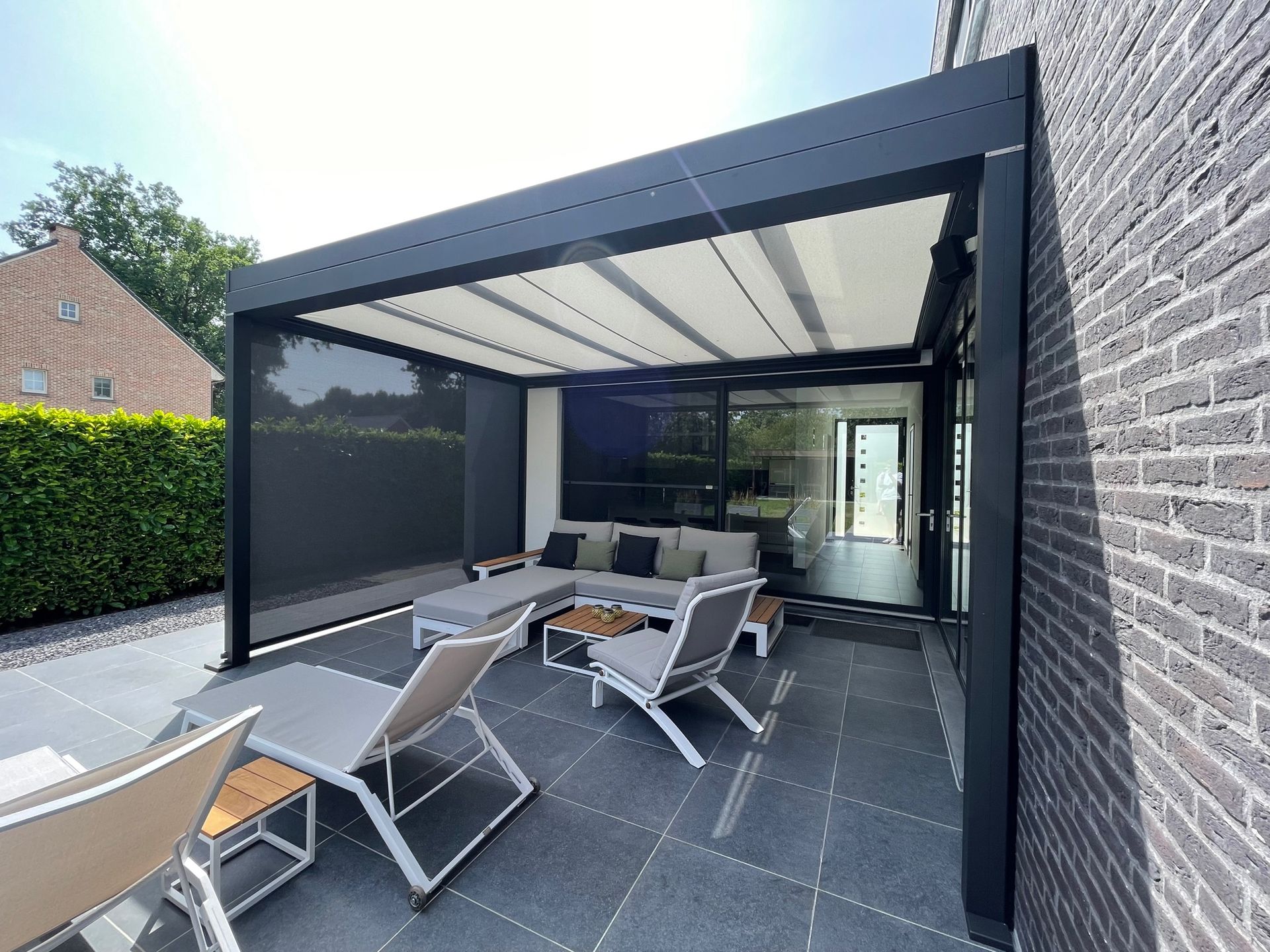 Glazen dak met verandazonwering 
