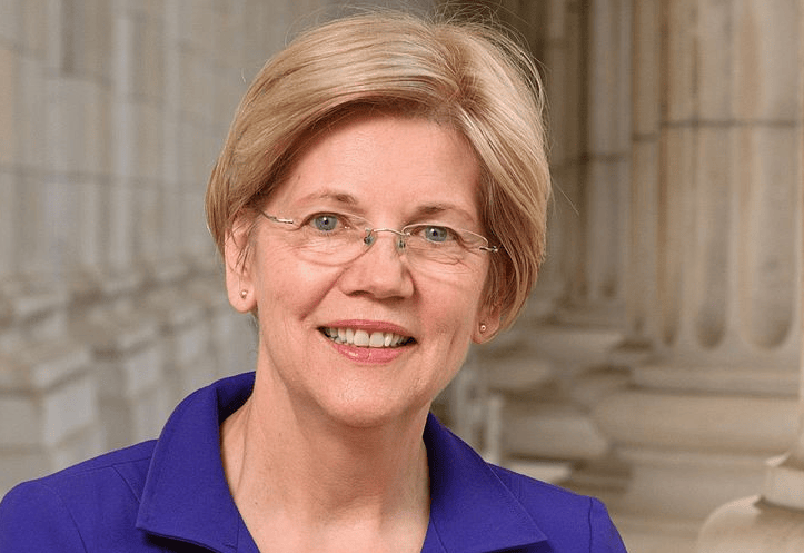 Elizabeth Warren, Tom Carper's bill to improve ethics requirements for presidential candidates signed into law