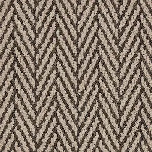 Dark patterned Berber carpet sample with herringbone design