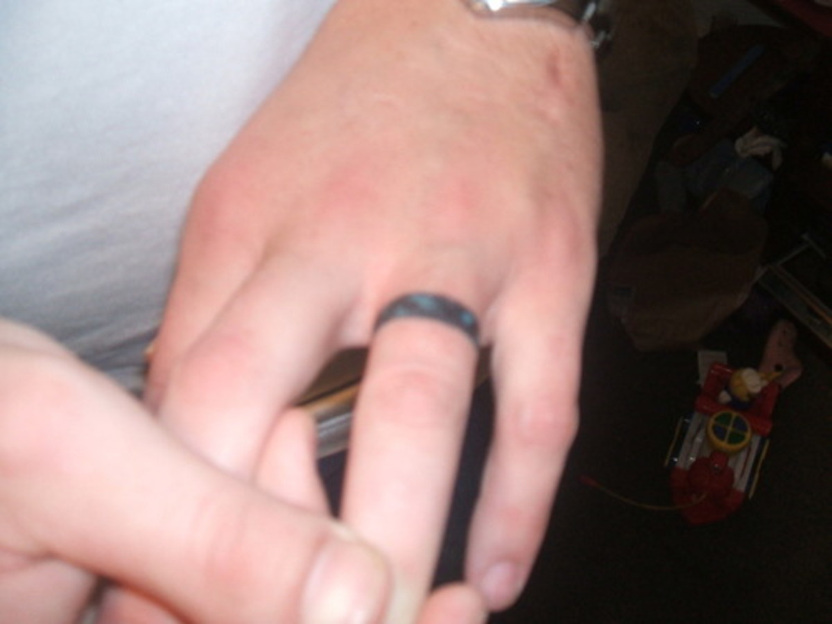 This elegant and understated band is made from . Wedding Ring Tattoos: Best Modern, Celtic, Religious