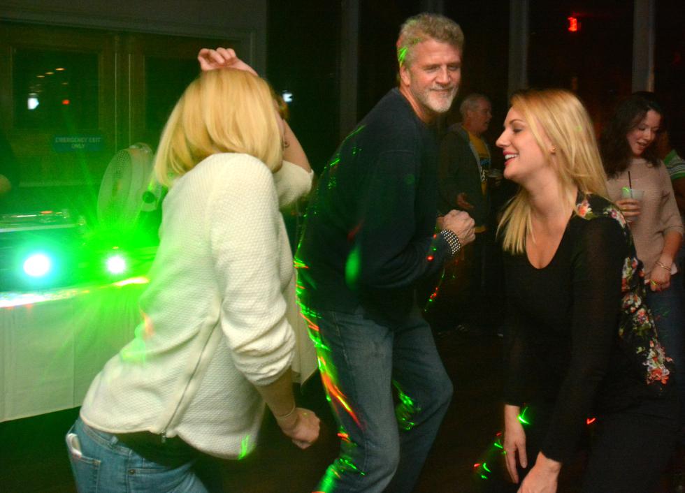 JERREY ROBERTS Rick Gifford, center, dances with Melissa Sullivan, left, and Kate Franklin at Blue Goose Friday. - JERREY ROBERTS | DAILY HAMPSHIRE GAZETTE