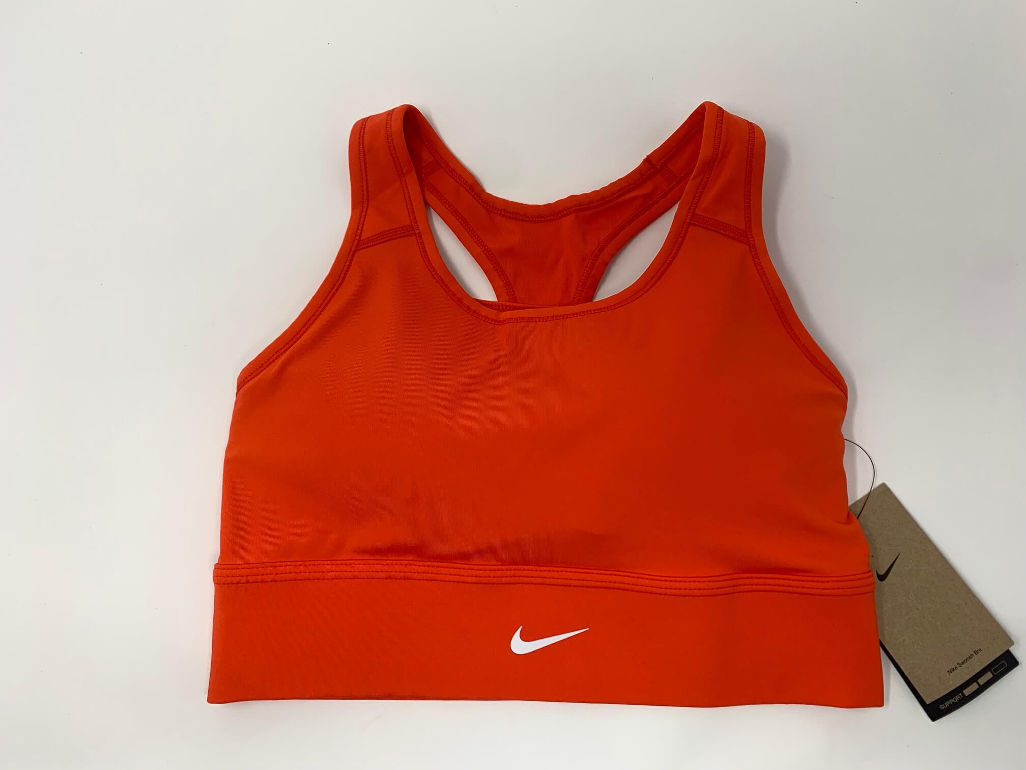 neon orange nike sports bra