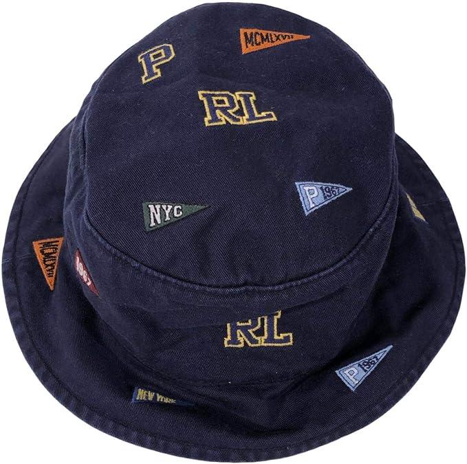 Navy bucket hat with embroidered patches.