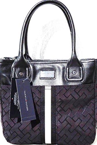 Black and patterned handbag with tags.